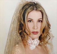 באיזו שמלת כלה התחתנו המעצבים?